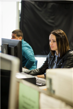 Students work on computer testing work 
